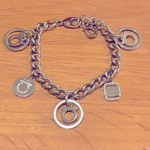 Salvatore Ferragamo silver charm bracelet.